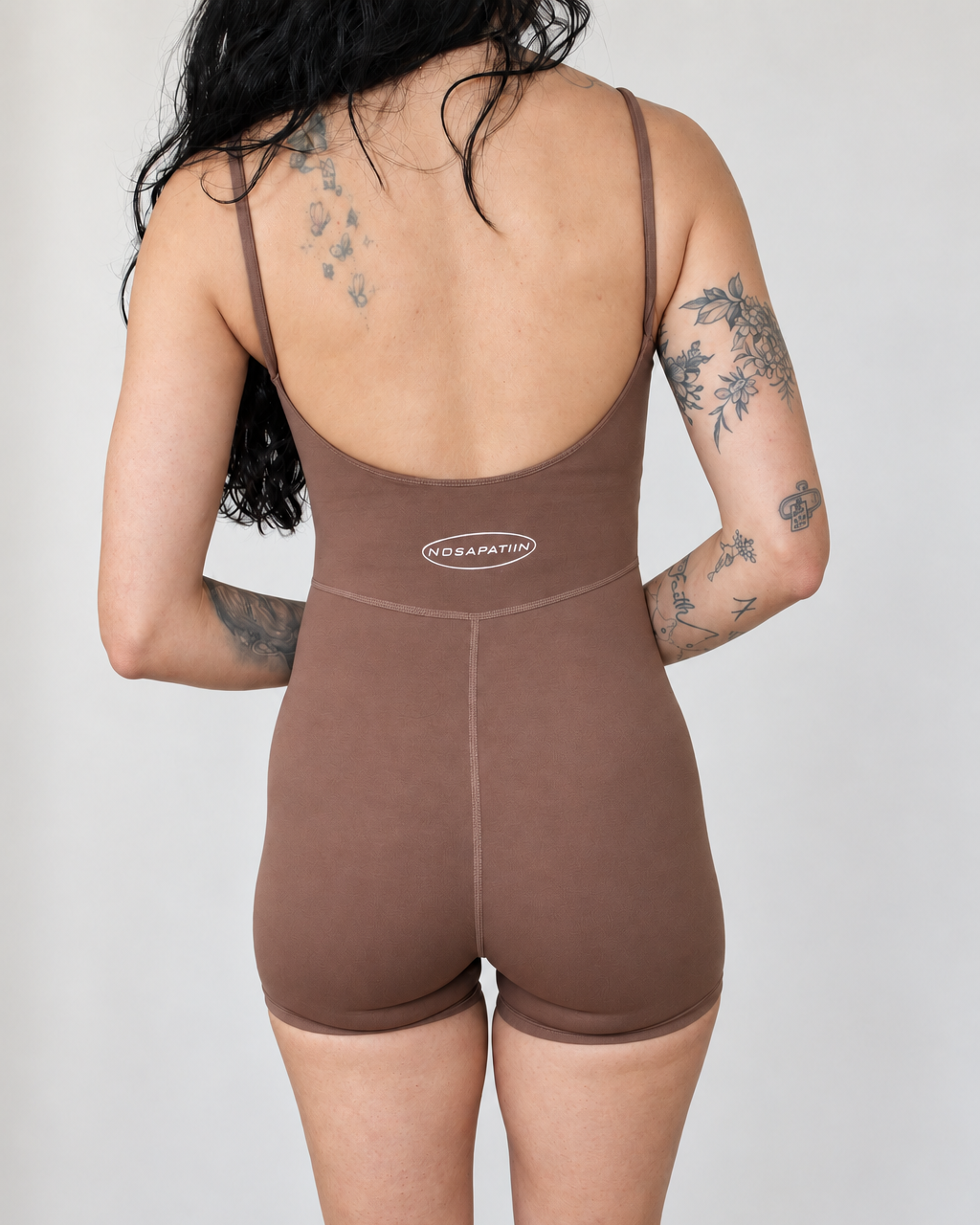 NS WOMENS PERFORMANCE ROMPER